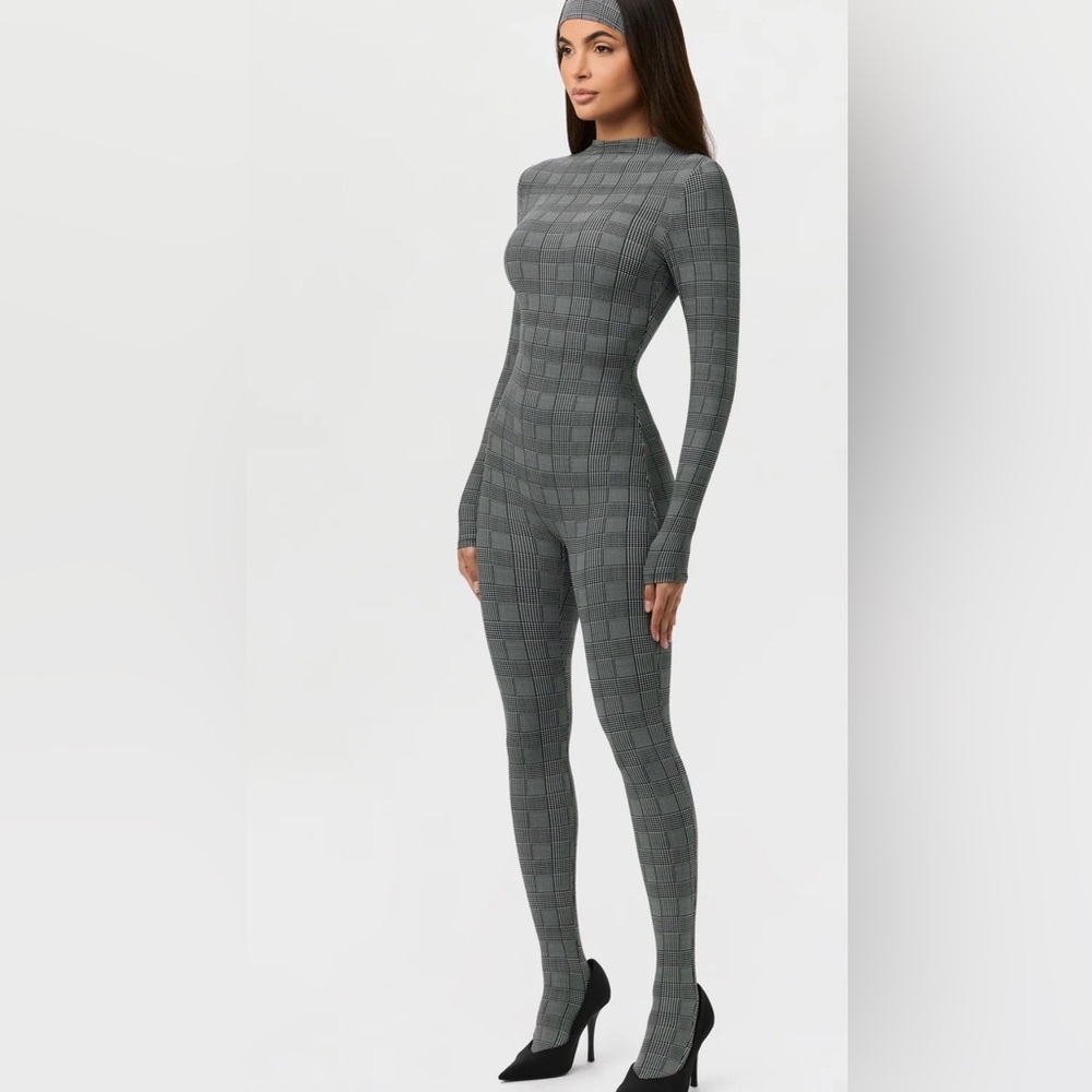 NAKED PRINT CLOSED TOE JUMPSUIT